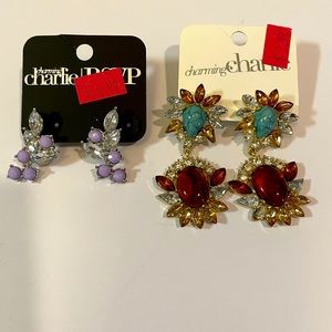 Costume jewelry earrings. Sold together.